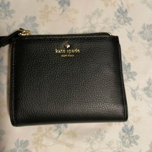 Kate Spade double zipper wallet.